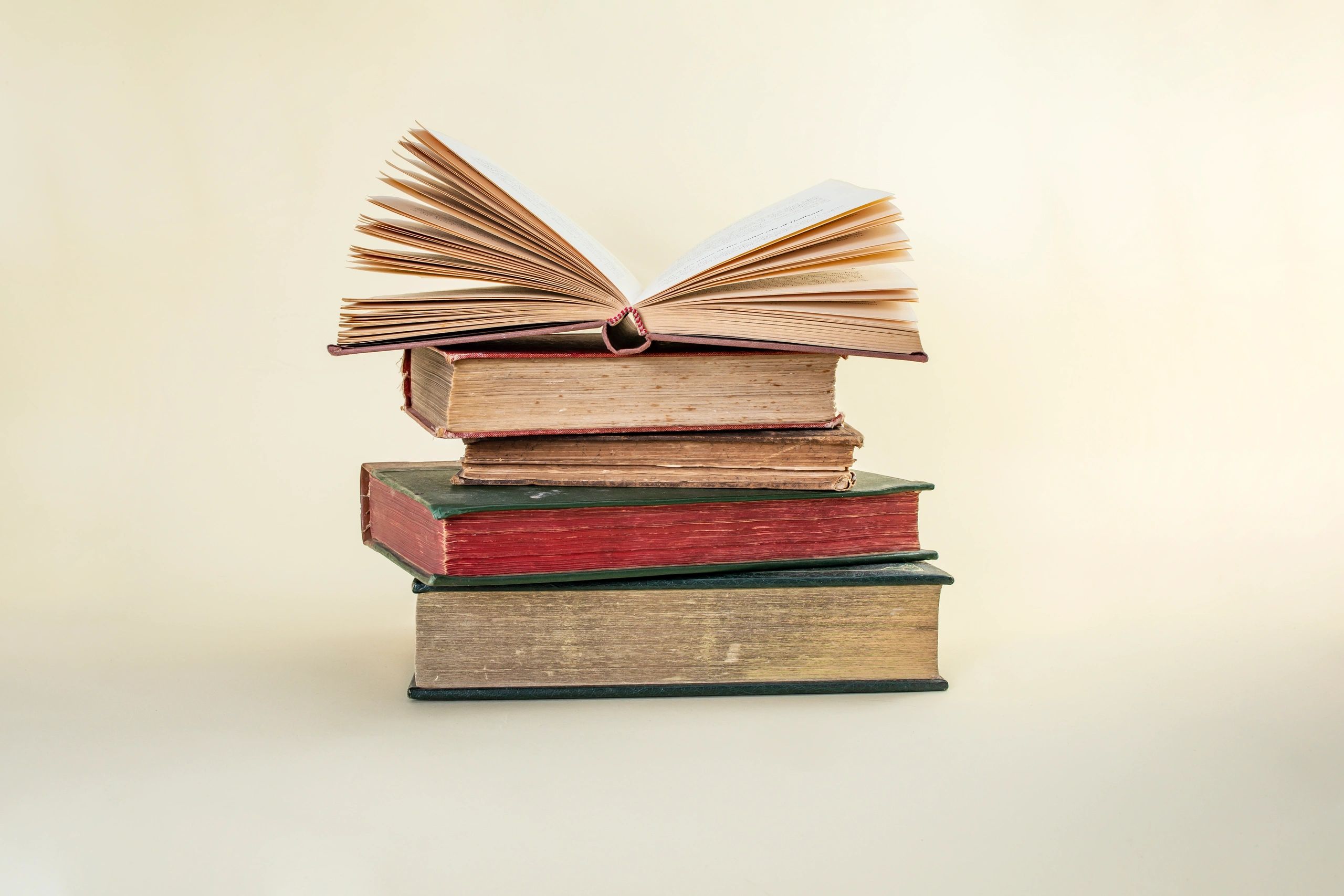 Vintage books representing articles and research